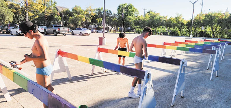 Painting rainbow crosswalks on Cedar Springs Road
